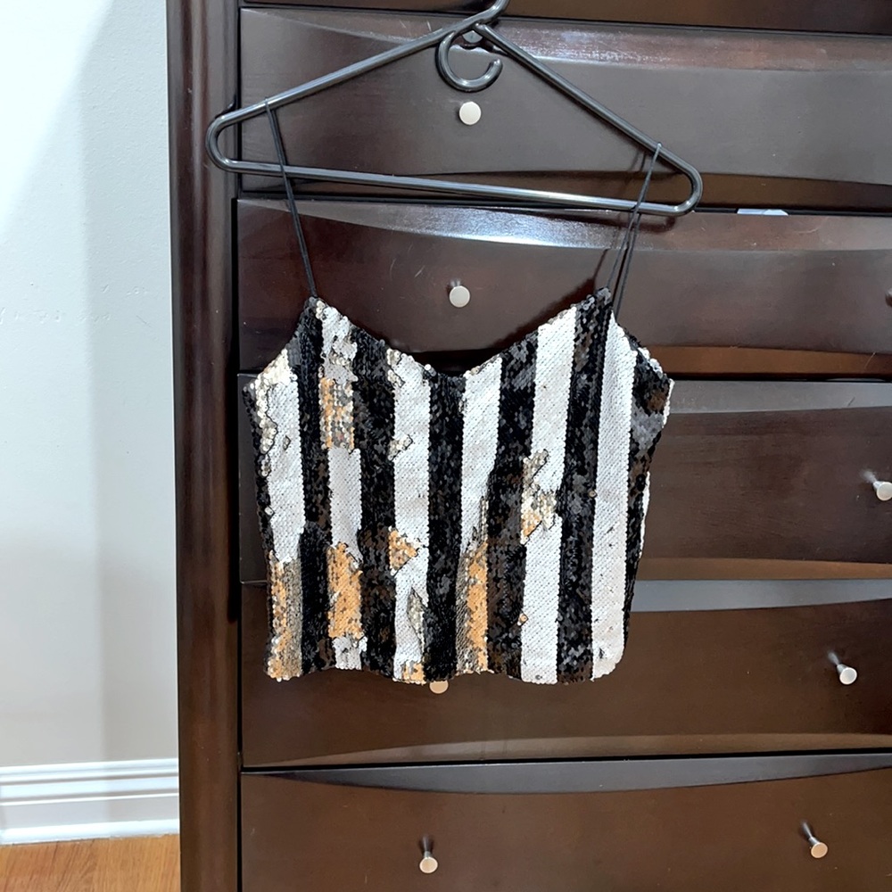 Top black white and gold.